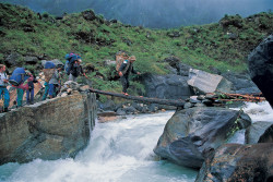 Porters on the Miristi Khola approaching the North side of Annapurna (8.091 m), Nepal